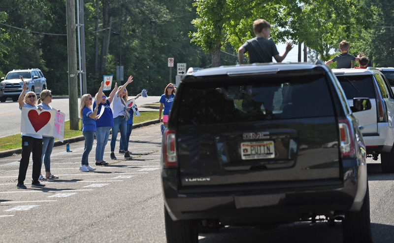 Teachers hold parade for students at Houston Academy